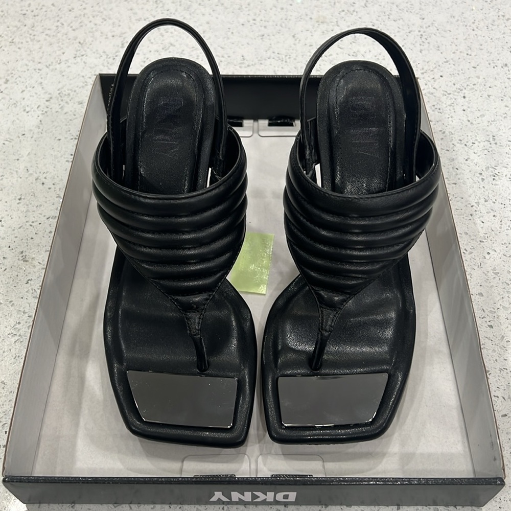 Black heeled sandal. Worn once, in very good condition.